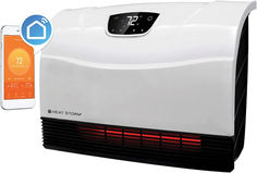 a white heater sitting next to an iphone with thermostar on it