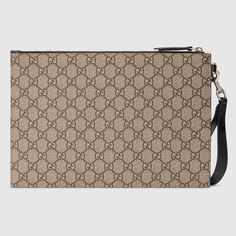 Description A pouch crafted from beige and ebony GG Supreme canvas. Completed by a leather trim, the accessory features the Kingsnake—a symbol thought to represent wisdom and power. Size: 12″ x 8″ x 0.5″ Inches / 30 x 21 x 1.5 CM 100% genuine leather, matching the quality of the Gucci product; Beige/ebony GG Supreme canvas, a material with low environmental impact Black leather trim Kingsnake print Four clots Interior open pocket Cotton linen and moiré lining Removable leather wrist strap Zipper Pouch Craft, Gucci Gifts, Women Sunglasses, Hermes Bags, Carry All Bag, Timeless Handbag, Vuitton Bag, Prada Bag, Wrist Strap