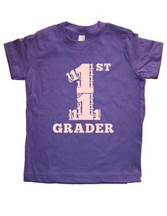 First Grader: Cute School Shirt for Your First Grader This super soft, pre-shrunk, 100% cotton shirt is designed and printed by us. It is comfortable, durable, and soft. This shirt is gift-friendly, and it arrives wrapped in tissue paper. ☆COLORS and SIZES AVAILABLE☆ SHIRT COLORS: Purple, Green, Gray, Hot Pink, Blue SIZES: 2T, 4T, 6, 8, 10, 12 The INK COLOR is: Black on Green and Gray; Light Blue on Blue; Pink on Hot Pink and Purple Grades Kindergarten through 5th Grade available: http://www.ets Purple Cotton Tops For Birthday, Purple Crew Neck Top With Name Print, Girl's Back, School Shirts, School Outfits, Top Tee, Kids Tops, First Day Of School, First Grade