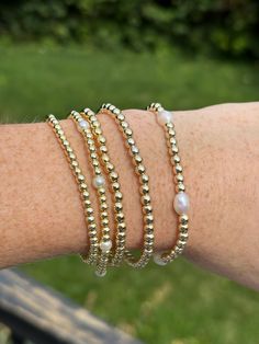 Looking for the perfect Christmas gift (or bracelet to wear to Christmas Eve dinner?) 💛 Stretchy gold stacking bracelets! (A similar look for WAY less . These beads are made of brass and plated in gold, meaning they are high quality and slow to tarnish IF properly cared for. Keep away from chemicals and perfumes! Note: these are not gold-filled, rather gold-plated. :)  💛1) Choose the BEAD SIZE and your bracelet WRIST SIZE using the sizing method and 2) choose the DESIGN you want ("Plain Gold," Gold Beads For Jewelry Making, Bracelet Stack Gold, Gold Meaning, Gold Ball Bracelet, Beaded Bracelet Stack, Gold Arm Band, Gold Bead Bracelet, Gold Stretch Bracelet, Crystal Bead Jewelry