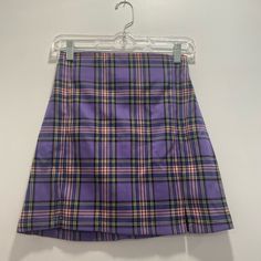 Purple Plaid Brandy Melville Skirt Brand New Purple Pleated Skirted Skort, Purple Fitted Pencil Skirt, Trendy Fitted Purple Skort, Casual Fitted Purple Mini Skirt, Fitted Purple Pencil Skirt, Fitted Purple Trendy Skort, Fitted Purple Pleated Mini Skirt, Trendy Purple Lined Mini Skirt, Trendy Lined Purple Mini Skirt