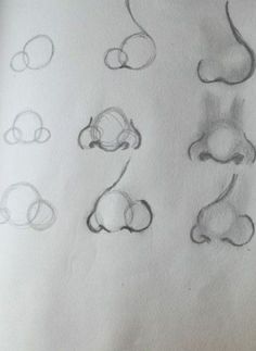 several drawings of different shapes and sizes on paper