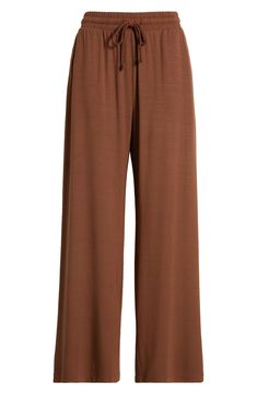 Feel the soft comfort of these lounge-worthy pants punctuated with flowy wide legs. 29" inseam; 26" leg opening; 12" front rise; 15" back rise (size medium) Elastic/drawstring waist Side pockets 95% Tencel® modal, 5% spandex Tencel modal is a sustainably produced fiber made with closed-loop processing and is certified with the EU Ecolabel as having a low environmental impact throughout the entire lifecycle Machine wash, dry flat Imported Home Clothes, Flowy Pants, Wide Legs, Environmental Impact, Drawstring Waist, Leg Pants, Wide Leg Pants, Wide Leg, Nordstrom