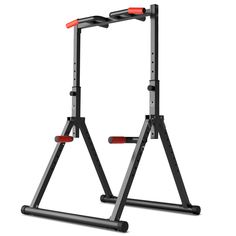 two squat stands with red handles on each side