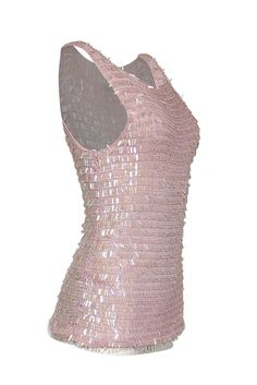 Add some sparkle to your wardrobe with this pink crochet knit tank top from Oscar de la Renta. Featuring a white iridescent sequin detail, this top is both pretty and fun. Complete your Y2K look by pairing it with a maxi skirt and strappy heels. Size S Shell 100% Rayon Lining 100% Polyester Pullover Sleeveless Sequin detail Bust 28" Waist 26" Shoulder to hem 28' Fitted Sequin Tank Top For Night Out, Disco Style Sleeveless Tank Top For Spring, Feminine Stretch Tops For Party, Stretch Feminine Party Tops, Chic Stretch Tank Top For Party Season, Stretch Sequined Tank Top, Disco Style Sleeveless Tank Top For Summer, Fitted Sleeveless Disco Top, Pink Stretch Tank Top For Night Out