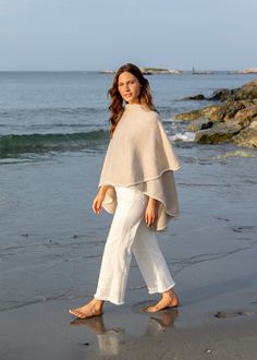 Made from a substantial merino wool and cashmere blend, our knit cape is the ultimate transition (and travel) piece. Wear it wrapped as a cape or draped open like a shawl, it strikes the perfect balance between upscale elegance and cozy functionality. Shawl Outfit, Cape Outfit, Sweater Cape, Cape Sweater, Knitted Cape, Alpaca Sweater, Cashmere Yarn, Oversized Scarf, Knit Wrap