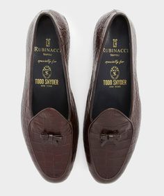 Mr Luca Rubinacci came up with the idea for these ‘Marphy’ loafers after failing to find smart, yet comfortable formal shoes.A shoe that is delicate, soft and designed to balance the ease and comfort of a slipper with the durability of a traditional loafer. Hand made in Italy, these are crafted with a crocco print leather outer and malleable leather sole, and finished with a leather trim and bow on top. 100% Leather Made in Italy Featuring custom insole and shoe bag made "specially" for Todd Sny Luxury Brogue-detailed Plain Toe Loafers, Luxury Cognac Slip-on Loafers, Luxury Designer Alligator Leather Loafers, Luxury Bridle Leather Loafers, Luxury Alligator Leather Loafers For Formal Occasions, Luxury Alligator Leather Loafers For Office, Luxury Classic Snip Toe Loafers, Luxury Crocodile Pattern Formal Loafers, Luxury Italian Craftsmanship Slip-on Loafers