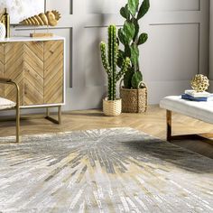 a living room with a rug, chair and cacti