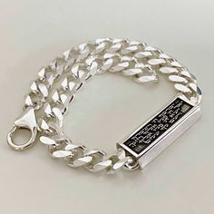 "Bold and masculine in its design but delicate in meaning, this 3D men's sterling silver box bracelet is a talisman for protection featuring a Hebrew engraving of the Jewish Priestly blessing. The prayer on one side reads: \"May God bless you and guard you. May God show you a favor and be gracious to you. May God show you kindness and grant you peace.\" And on the other side: \"And whatsoever he doeth shall prosper\" (Psalms 1:3). This men's bracelet is a perfect gift for the man in your life, a Symbolic Sterling Silver Bracelet Gift, Symbolic Bracelet With Sterling Silver Clasp For Gift, Classic Etched Sterling Silver Bracelet As Gift, Spiritual Sterling Silver Bracelet For Anniversary, Sterling Silver Spiritual Bracelet For Anniversary, Sterling Silver Spiritual Bracelet, Spiritual Sterling Silver Bracelets With Silver Clasp, Engraved White Gold Bracelet In Sterling Silver, Engraved Sterling Silver Bracelet In White Gold