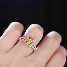 This is a natural citrine engagement ring, with twist band. This ring is marked S925 Main stone is 8x6mm Emerald cut, about 1.5ct. Wedding band: CZ diamond. I accept custom making order.Please contact me if you need this service. All the jewelry in my store is handmade.It may take 2-3 weeks to finish. For all the jewelries,there is a 14 days money back guarantee.You can return it in the time frame without any questions.However there maybe handcrafted fee and shipping fee deducted from the origin November Birthstone Engagement Rings, Citrine Wedding Ring, Citrine Engagement Ring, Citrine Wedding, Engagement Rings Romantic, Birthstone Engagement Rings, Opal Engagement Ring Set, Citrine Ring Engagement, November Birthstone Ring