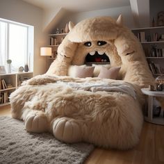 a large stuffed animal sitting on top of a bed