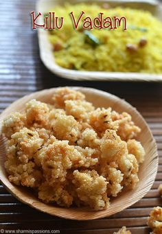 some food is on a wooden plate and next to another dish that has rice in it