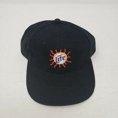 Vintage Miller Lite Beer Sunrays Logo Strapback Hat With A Spanish Slogan: Saborea Una Verdadera Cerveza Pilsner Which Translates: Savor A Real Pilsner Beer Men's One Size Fits Most New/Unworn No Manufacturer Warranty Implied Or Given Black Snapback Fitted Hat For Summer, Retro Black Dad Hat With Curved Brim, Retro Black Baseball Cap With Embroidered Logo, Miller Genuine Draft, Lite Beer, Pilsner Beer, Miller Lite, Draft Beer, Strapback Hats