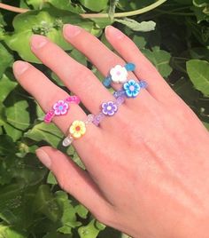 This gorgeous flower beaded ring is made with polymer clay flower beads and glass seed beads on aluminium wire. They are great pop of colour! You can customize the flower and bead colour to make YOUR perfect ring! Flower bead: 8x4mm Same Ring Without The Flower Bead: https://etsy.me/3414RZ4 Please note to keep in best condition, avoid contact with water More from our shop: Turquoise braided ring- https://etsy.me/33UQVQF Braided rings- https://etsy.me/3u3noPW Gold resin rings- https://etsy.me/3tveARV Flower Beaded Ring, Beautiful Anklet, Stock Flower, Braided Ring, Beaded Ring, Ring Flower, Clay Flower, Polymer Clay Flowers, Resin Ring