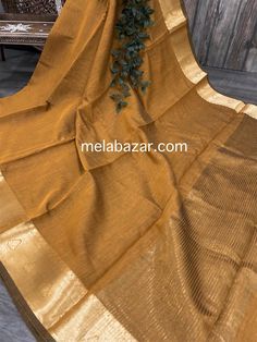 Solid ochre color sheer saree with Banarsi gold border . Mix and match with different blouses and accessories!! Soft cotton silk plain saree with a zari border palla. -Fall attached -Blouse fabric included Gold Unstitched Blouse Piece Traditional Style, Unstitched Raw Silk Blouse Piece In Gold, Unstitched Raw Silk Gold Blouse Piece, Unstitched Gold Raw Silk Blouse Piece, Unstitched Bollywood Blouse Piece In Gold, Unstitched Bollywood Gold Blouse Piece, Unstitched Gold Bollywood Blouse Piece, Gold Anarkali Blouse Piece With Pallu Detail, Gold Anarkali Blouse Piece With Pallu