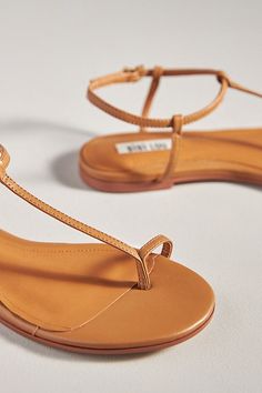 Leather upper, insole Rubber sole Buckle styling Imported | Toe Loop Flats by Bibi Lou in Brown, Women's, Size: 36, Leather/Rubber at Anthropologie Gold Sandals Flat, Nude Flat Sandals, Flat Sandals For Women, Nude Flats, Brown Flats, Gold Sandals, Flat Sandals, Rubber Sole, Womens Sandals