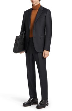 Crafted from the brand's signature Trofeo wool, this suit features an impeccable fit and modern polish for a subtly sophisticated look and daylong comfort. Jacket has notched lapels; nonfunctional four-button cuffs; chest pocket; flap pockets; side vents Trousers have zip fly with button-tab closure; front slant pockets; back button-welt pockets Jacket is lined; trousers are lined to the knee 100% wool Dry clean Made in Turkey Men's Designer Clothing Zegna Suits Men, Tailored Luxury Wool Suit, Luxury Tailored Wool Suit, Tailored Luxury Three-piece Suit For Work, Luxury Tailored Three-piece Suit For Work, Luxury Notch Lapel Three-piece Suit For Work, Luxury Three-piece Suit With Notch Lapel For Work, Luxury Three-piece Suit For Workwear, Luxury Wool Business Suits