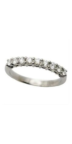 a white gold wedding ring with five stones