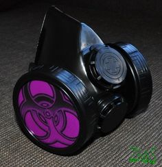 Cyber Mask made from PVC and plastic .   Gas Mask has inserts in the shape of a violet Biohazard , Inserts a removable easy  D = 2.76 inch. (70 mm)  .   Cyber Goth Mask adult sized. An adjustable elastic band long and strong for easy fit and comfort on anyone. You can choose additional other biohazard , radiation , skull symbols by adding it from my other listing : https://www.etsy.com/listing/1741175014/biohazard-simbol-biohazard-inserts-cyber?click_key=2f9ef91c13e1e2540e1d76a4f61d7aeff83446ba%3A1741175014&click_sum=7b7078f8&ref=shop_home_active_2  Modified for easy breathing. All modification are made by hand ! Hi quality, by ZHOS ! Item new without tags. Good for fashion , festivals, parties, cyber gothic look, like gift .              Item will come to you well packed Shipping: We ship E Girl Fashion, Goth Mask, Gothic Mask, Cosplay Mask, Fashion Masks, Gothic Looks, Organic Glass, Cool Masks, E Girl