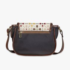 Carry a piece of Scandinavian chic with our Danish Modern Floral Saddle Bag. This mid-century inspired crossbody handbag adds a touch of vintage charm to any outfit. Compact yet spacious, it's perfect for on-the-go style. Bring out your inner flower child today! Key Features ✅ Made of premium PU leather fabric. ✅ Durable adjustable shoulder strap for various occasions. ✅ Classic Flap type & Smooth top zipper closure. ✅ Ultra-large interior capacity, big compartment with 3 pockets for the storage of daily must-haves. All of our products are made to order just for you! Please allow up to 14 business days for your handbag to be crafted and shipped. We appreciate your patience as we ensure you receive a high-quality, custom-made item. Vintage Satchel With Detachable Strap For On-the-go, Retro Saddle Shoulder Bag With Detachable Strap, Retro Satchel Saddle Bag For Everyday Use, Retro Satchel Flap Bag With Adjustable Strap, Retro Crossbody Saddle Bag For Travel, Retro Crossbody Flap Bag With Detachable Strap, Retro Flap Bag With Detachable Strap For Daily Use, Retro Flap Bag With Detachable Strap For Travel, Retro Flap Bag With Detachable Strap For Everyday