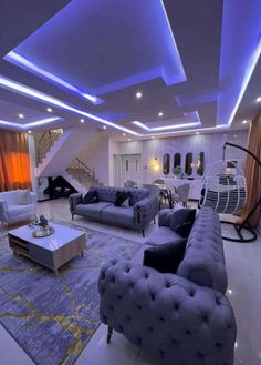 a living room filled with furniture and lights