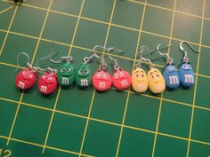 M&M faces in bright colors 3 orange 2 blue 1 green and 2 red Playful Personalized Multicolor Earrings, Playful Multicolor Personalized Earrings, Character Earrings, M&m Characters, Green Earrings, Bright Colors, Etsy Earrings, Dangle Drop Earrings, Drop Earrings