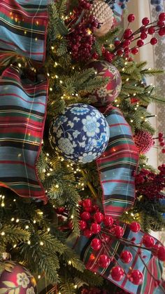 a christmas tree decorated with ornaments and lights