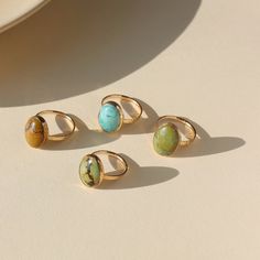 Meet the Turquoise Nomad Ring– our best-selling statement ring. With its various earthy colors and natural patterns, it will make you feel like the traveler you always dreamed of being. Choose from a sterling silver or 14k gold filled setting, each hand forged in our small, midwest studio. We have a limited number of stones available, so don't miss out on this forever favorite! DETAILSSizes 4-12 including half sizes12x16mm oval stoneChinese turquoise Hypoallergenic and Nickel-Free. We recommend Earthy Rings, Ring Photoshoot, Rock Rings, Turquoise Gold Ring, Natural Patterns, Metal Smithing, Forever Jewelry, Turquoise Rings, Childrens Jewelry