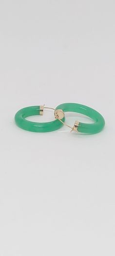 GREEN Jade Hoop Earrings in 14K Yellow Gold. 24 millimeters. Green Jade 14k Yellow Gold Hoop Earring. JADE Lover. Product Info: -Earring diameter: 24 millimeters -Metal: 14K. -Stone: Green Jade. -Colors: Green. -Finish: 14k Yellow gold. -Stone dimension: 4mm -Nice Gift box is included. Green 14k Gold Hoop Earrings, Small Hoop Green Earrings For May Birthstone, Elegant Green Hoop Earrings, Small Green Pierced Hoop Earrings, Jade Hoop Earrings As Gift, Gold Jade Hoop Jewelry, Green Jade Hoop Jewelry, 14k Gold Green Pierced Earrings, Green Hoop Earrings For May Birthstone