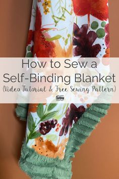 a towel hanging on the wall with text overlay that says how to sew a self - binding blanket