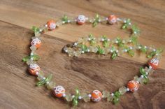 Estate Vintage Jewelry Necklace Beaded , Faux Pearls  White  Green Orange Flower  Leaf C-034 Vintage Flower-shaped Beaded Necklace As Gift, Retro Orange Necklace Gift, Vintage Orange Necklace With Colorful Beads, Vintage Flower Shaped Beaded Necklaces, Vintage Flower-shaped Beaded Necklaces, Vintage Flower Beaded Necklaces, Handmade Retro Green Beaded Necklace, Vintage Handmade Orange Necklace, Vintage Orange Beaded Necklace Gift