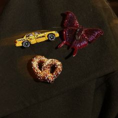 Introducing our deliciously charming Pretzel Brooch! Pin it to your favorite jacket, bag, or scarf! Perfect for our fashion-forward customers who love this iconic NYC snack. Embroidered Brooch, Mignonne Gavigan, Scarf Necklace, Embroidered Butterfly, Pre Fall Collection, Virtual Fashion, Butterfly Brooch, Fabric Beads, Thread Work