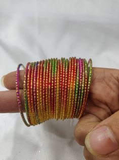 Welcome to our shop We bring to you very ethnic products from core of India almost every thing is handmade or custom made Set of 22 Bangles in multiple colors Size 2.4 We will be happy to serve you Punjabi Bangles, Metal Bangles Set, Pakistani Bangles, Fancy Bangles, Kids Lehenga Choli, Metal Bangles, Kids Lehenga, Bracelet Sets, Bangles Set