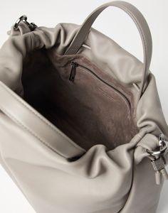 Mellow large shopper bag in soft leather with monili The excellence of Brunello Cucinelli materials enriches the new large Soft leather Mellow Shopper bag. The natural material’s extraordinary suppleness emphasizes the timeless bucket design, offered in a large size for maximum capacity and versatility. The drawstring closure gathers the accessory’s volume, creating a slightly gathered effect. The precious monili detail adds a delicate sparkling note. Everyday Calf Leather Bags With Silver-tone Hardware, Shopping Bags In Calf Leather With Silver-tone Hardware, Calf Leather Bags With Silver-tone Hardware, Luxury Calf Leather Bag With Silver-tone Hardware, Shopping Shoulder Bag With Silver-tone Hardware And Calf Leather, Large Shopper Bag, Boutique Online, Eyewear Womens, Shopper Bag