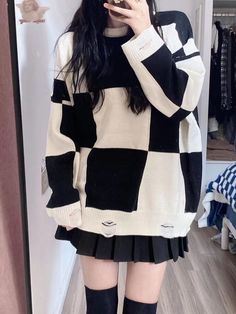 Step up your fashion game with our uniquely designed checked pattern sweater. This eye-catching piece showcases a bold black and white checkerboard pattern, perfect for making a statement. The sweater is crafted with attention to detail, featuring cinched cuffs and hem to provide a snug, comfortable fit. Adding to its distinctive style, the sweater includes a hollow-out distressed design that offers a trendy, edgy look. Ideal for those who love to stand out, this sweater is both chic and versatile.   Please note, the price is for one sweater only. SizeMLLength7075Sleeve Length4648Bust6971Shoulders2223 Gothic Sweater, White Sweater Outfit, Steampunk Fashion Female, Steampunk Fashion Male, Gothic Skirts, Sweater Outfit, Leg Sleeves, Checkerboard Pattern, Pattern Sweater