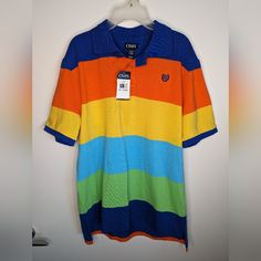 Chaps Color-Block T-Shirt In Vibrant Shades Of Colors. Size 18-20 (Xl) *Possibly Fits Some Adult Males* Polo T-Shirt In Varying Color-Block Style Playful Multicolor Color Block T-shirt, Sporty Multicolor Color Block T-shirt, Rainbow Color Block Cotton Tops, Blue Short Sleeve Polo Shirt For School, Blue Casual Polo Shirt For School, Blue Casual School Polo Shirt, Casual Blue Polo Shirt For School, Multicolor Color Block T-shirt For Streetwear, Retro Blue Tops For School