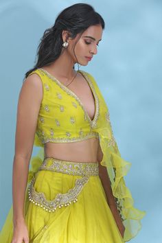 Dance the night away at sangeet and weddings in this charming bright yellow embroidered lehenga with dupatta. Shop designer lehengas in USA from Pure Elegance. Yellow Choli With Sheer Dupatta For Navratri, Yellow Anarkali Set With Sheer Dupatta For Reception, Yellow Pre-draped Saree With Gota Work For Party, Yellow Choli With Resham Embroidery For Party, Party Choli With Resham Embroidery In Yellow, Party Yellow Lehenga With Resham Embroidery, Yellow Floor-length Choli For Reception, Yellow Lehenga For Reception And Festivals, Festive Yellow Choli With Sheer Dupatta