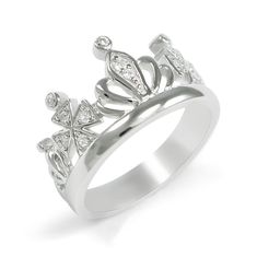 A beautiful sterling silver crown ring with simulated diamonds, perfect for the royal in you. This ring is the perfect touch of class and sophistication. Find your inner queen! Please specify ring size in drop down bar. Formal Rings With Crown Shape And Prong Setting, Formal Crown Rings With Prong Setting, Formal Cubic Zirconia Ring With Crown Design, Formal Crown Design Cubic Zirconia Rings, Elegant Cubic Zirconia Crystal Ring With Bling, Princess Style Cubic Zirconia Wedding Jewelry, Elegant Diamond Crystal Ring With Bling, Elegant Bling Crystal Promise Ring, Elegant Diamond White Diamond Ring With Bling