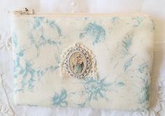 Handmade pouch for rosary, jewelry, keepsake, gift etc. Made with cotton fabric and lining. Zipper closure. Approx. 4" x 3". Cream Zipper Pouch As Gift, Rectangular Cream Coin Purse For Gift, Rosary Jewelry, Keepsake Jewelry, Gift Pouch, Prayer Beads, Keepsake Gift, Rosary, Bead Charms