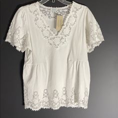 New With Tags From Sundance Catalog. Beautiful White Cotton Top With Lace Details. Simple And Lovely. Perfect To Dress Up Your Favorite Jeans. 100% Cotton Body With Cotton/Nylon Lace. Size Xs And M. Catalog List Price Is $108, Asking $59 Obo. Embroidered Lace V-neck Top, Fitted Embroidered Lace Top For Summer, Fitted Embroidered Top With Lace Trim, Fitted V-neck Blouse With Broderie Anglaise, Fitted Bohemian Embroidered Lace Top, White Lace Fitted Embroidered Top, White Fitted Lace Embroidered Top, White Lace Embroidered Fitted Top, Fitted White Lace Embroidered Top