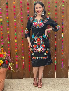 -This Beautiful Long Mexican Colorful Floral Dress is the perfect dress for a fun night out or a special event. -It is full of multicolor embroidered flowers and has some crocheted details. -This dress has ties on the back in order to adjust the fit. - You can purchase the dress either with or without the belt. The accesories shown with this dress may purchased as well and Can be found here: Earrings: https://www.etsy.com/es/listing/872372628/filigrana-clasica-de-gota-arete-mexicano?ref=listings Traditional Spring Party Dresses, Long Sleeve Dresses With Multicolor Embroidery For Party, Traditional Summer Embroidered Party Dress, Traditional Embroidered Summer Party Dress, Traditional Spring Party Embroidered Dress, Traditional Spring Embroidered Party Dress, Traditional Embroidered Dress For Spring Party, Traditional Black Fiesta Dress, Black Embroidered Dress For Fiesta In Spring