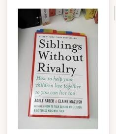 a book sitting on top of a white table