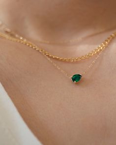 Pear shape Emerald Solitaire necklace in 14k Gold Prettiest green. Wear it alone or layered.•Sold as a pair or as a single stud.•14k solid gold•Emerald measures 7x5mm 0.73-0.75 carat •This lab-created emerald has a chemical make-up identical to the finest emeralds. Nose Pins, Solitaire Necklace, Lab Created Emerald, Solitaire Necklaces, Meaningful Jewelry, Emerald Necklace, Gold Necklace Designs, Pretty Green, Emerald Jewelry