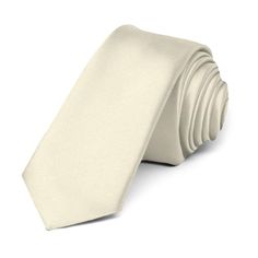 This ivory premium tie is cut in our skinniest and trendiest 2-inch width. Its heavyweight woven material and smooth satin finish provides a sharp look that is suited for your most formal occasions.We recommend this shade for a light, off-white color. Product Features • Skinny 2" width, at the widest point • 57" length, tip to tip• Color is ivory • Made from 100% Polyester Microfiber • Smooth, satin finish • Imported Elegant Adjustable Solid Ties, Classic Satin Suit And Tie Accessories, Wedding Suit And Tie Accessories With Satin Finish, Classic Fitted Satin Suit And Tie Accessories, Classic Wedding Ties With Satin Finish, Classic Adjustable Satin Ties, Elegant Fitted Suit And Tie Accessories With Satin Finish, Elegant Fitted Satin Ties, Classic Satin Finish Tie For Black-tie Events