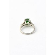 Stunning GIA certed natural Tsavorite Garnet mounted in a simple tapered baguette diamond and platinum mounting.  The 2.78 carat tsavorite  2.78 is an gorgeous green transparent color.    US size 4.5.  It can be sized.  The ring measures .66" wide by .33" tall. Classic Green Baguette Cut Diamond Ring, Green Platinum Emerald Ring For May Birthstone, Green Platinum Ring For May Birthstone, Green Emerald Ring With Polished Finish, Classic Green Baguette Cut Emerald Ring, Classic Tsavorite Emerald Ring With Prong Setting, Green Tsavorite Emerald Ring For Formal Occasions, Classic Baguette Cut Green Emerald Ring, Formal Green Gemstone Emerald Ring