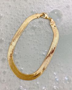 A beautiful sleek golden herringbone strand you can wear everyday 14k gold filled  7.5” inch total length   Layers perfectly Gold Snake Chain, Jewelry Cleaning Solution, Snake Chain Bracelets, Gold Snake, Trendy Clothing, Small Jewelry, Bracelet Gold, Modern Fashion, Monte Carlo