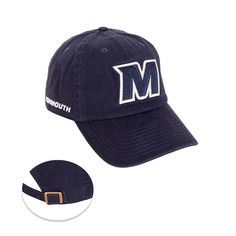 a hat with the letter m on it and an embroidered patch in front of it