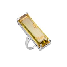 Add an extra touch of sophistication to your ensemble with our Lucille Rectangle Ring. This ring is a masterful blend of modern design and timeless elegance, designed to draw attention and create an alluring focal point on your hand. The long rectangular centerpiece is a unique element that gracefully elongates your fingers and adds a touch of contemporary style. View this post on Instagram A post shared by 𝔹𝕠𝕦𝕟𝕜𝕚𝕥 𝕁𝕖𝕨𝕖𝕝𝕣𝕪 (@bounkitnyc) Modern White Gold Ring With Rectangular Stone, Modern White Gold Rings With Rectangular Stone, Modern Gemstone Party Rings, Modern Silver Ring With Rectangular Stone, Modern Silver Rings With Rectangular Stone, Luxury Baguette Cut Ring For Party, Formal Sterling Silver Ring With Rectangular Stone, Modern Sterling Silver Topaz Ring For Formal Occasions, Sterling Silver Ring With Rectangular Stone For Formal Events