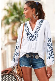 The embroidery details on this long sleeve blouse are absolutely stunning. Linen Shorts Women, White Top Women, Shop Tops, Pretty Blouses, Tops Casual, Loose Outfit, Tops Online, Beautiful Clothes, V Neck Blouse