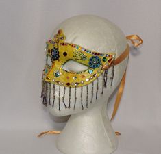 "Beaded masquerade ball mask OOAK - Mardi Gras - Carnival - Halloween - costume mask These wonderful & whimsical beaded masks are handcrafted & all each one is a unique and One of a Kind (OOAK) piece. These are not only great as art to be displayed on a wall or shelf, but also made sturdy enough to be used for costume purpose. One size fits most adults These masks are created using mask blanks that I have covered with several layers of tissue paper & decoupage. They have been further Yellow Costumes For Cosplay And Themed Events, Themed Masquerade Mask For Costume Party And Cosplay, Gold Masquerade Mask For Carnival Cosplay, Masquerade Eye Mask For Cosplay Events, Cosplay Events Eye Mask For Masquerade Costume, Themed Masks And Prosthetics For Cosplay Events, Cosplay Events Masquerade Eye Mask, Themed Masks And Prosthetics For Party And Cosplay Events, Yellow Costume For Cosplay And Costume Parties